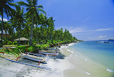 The beach at Candidasa, popular east coast resort which has lost a lot of sand to erosion, Bali, Indonesia, Asia