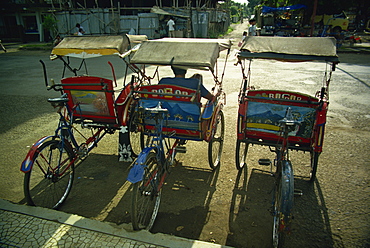 Parked becaks (trishaws), Bogor, West Java, Indonesia, Southeast Asia, Asia