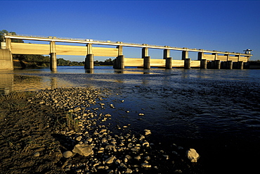 The Diversion Dam at Red Bluff where the Sacramento River creates the Tehama-Clousa Canal and irrigates 200,000 acres of the valley, Sacramento Valley, California, Usa