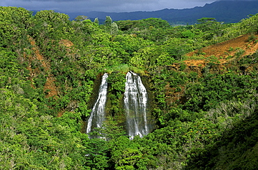 The Opaekaa Falls on the lush slopes inland from Wailua on the east coast of Kauai, the 'Garden Island', Kauai, Hawaii, USA