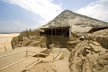 The peak of Cerro Blanco mountain and platforms at this adobe brick temple pyramid of the Moche people (100BC-AD850) in the desert north, Huaca de la Luna, Trujillo, Peru, South America