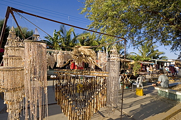 Street stalls selling souvenirs and jewellery on the Pan-American Highway and main street at this surfing resort in the far north near the Ecuadorean border, Mancora, Peru, South America