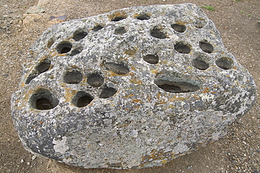 Rock with holes of uncertain use at the most important Inca site in Ecuador, elevation 3230m, Ingapirca, Canar Province, Southern Highlands, Ecuador, South America