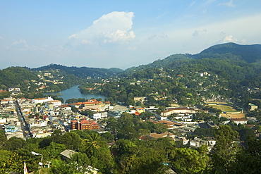 View of the lake, Queens Hotel and Kandy City Centre complex on the left, with Bogambara Prison and Stadium on the right, Kandy, Sri Lanka, Asia