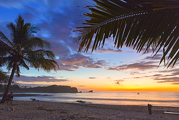 Sunset by the southern headland of beautiful Playa Pelada beach, Nosara, Nicoya Peninsula, Guanacaste Province, Costa Rica