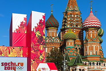 Torch Relay stand for Sochi Winter Olympics 2014, with onion domes of St. Basil's Cathedral beyond, Red Square, Moscow, Russia, Europe