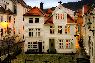 House looking hygge (cosy) with Nordic Christmas star lanterns on Tvedtegarden, Sliberget Street. Bergen, Hordaland, Norway, Scandinavia, Euruope