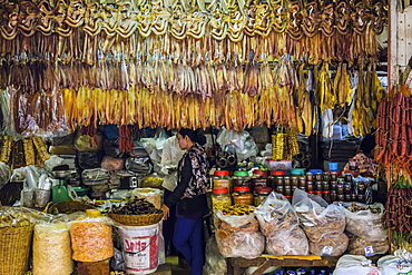 Smoked fish hanging at stall in the Psar Chas Old Market in the centre of this important NW tourist town, Siem Reap, Cambodia, Indochina, Southeast Asia, Asia