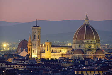 The Duomo Santa Maria del Fiore, seen illuminated at dusk from the Piazzale Michelangelo, Florence, Tuscany, Italy 