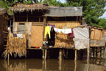 House on stilts on the Rach Thi Nghe, a backwater of the Saigon River in Ho Chi Minh City (formerly Saigon), Vietnam, Indochina, Southeast Asia, Asia