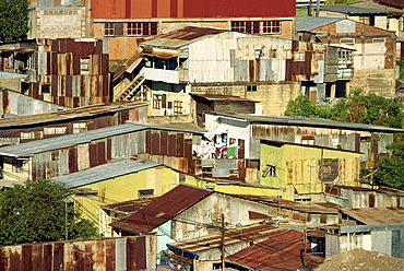 Corrugated iron buildings in a poor barrio north of the centre of San Jose, Costa Rica, Central America