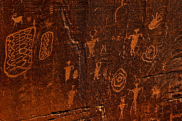 Horned anthropomorphs holding shields, Formative Period Petroglyphs, Utah Scenic Byway 279, Potash Road, Moab, Utah, United States of America, North America 