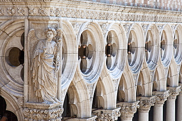 Exterior detail of carving of an angel on the 15th century Palazzo Ducale (Doges Palace), Piazza San Marco (St. Mark's Square), Venice, UNESCO World Heritage Site, Veneto, Italy, Europe