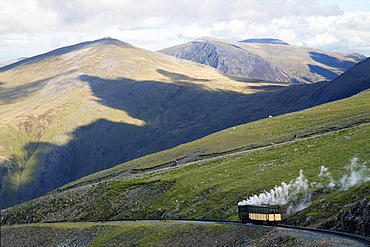 Steam engine and passenger carriage on trip down Snowdon Mountain Railway, Snowdonia National Park, Gwynedd, Wales, United Kingdom, Europe