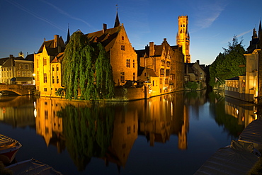 Evening reflections on Rozenhoedkaai, with Belfry (Belfort) Tower, UNESCO World Heritage Site, Bruges, West Flanders, Belgium, Europe