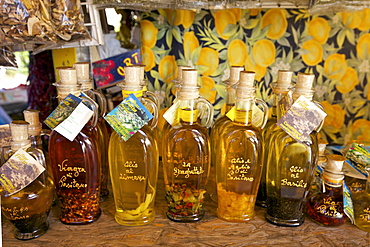 Olive oil for sale on market stall near Positano, Amalfi Coast road, Campania, Italy, Europe