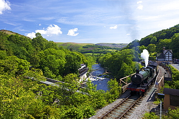 Steam train pulls out of Berwyn station on the Llangollen Heritage Railway, Dee Valley, Denbighshire, Wales, United Kingdom, Europe