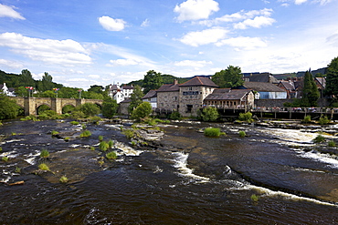 Stone bridge across the river Dee, first constructed in 1345 by John Trevor I, Bishop of St. Asaph, Llangollen, Denbighshire, Wales, United Kingdom, Europe