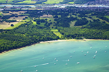 Aerial view of yachts racing in Cowes Week on the Solent, with Osborne House in background, Isle of Wight, England, United Kingdom, Europe