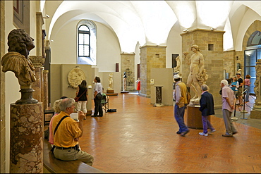 Tourists and visitors in the Michelangelo Room, Bargello, Florence, Tuscany, Italy, Europe