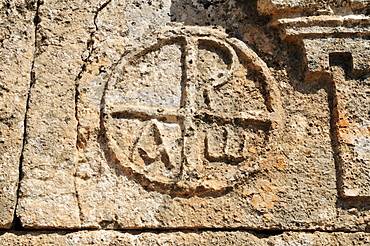 Christian ornament on a house ruin at the archeological site of Khirbet Hass or Shinsharah, Dead Cities, Syria, Middle East, West Asia