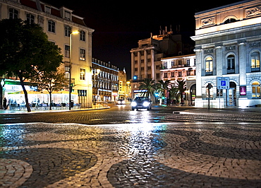 Wave patterns in the cobblestone pavement in front of the National Theatre Dona Maria on the Rossio square or Praca Dom Pedro IV., Lisbon, Portugal, Europe