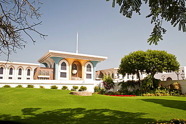 Main building of the Al Alam Palace, as seen from the side across the garden, in Muscat, Oman, Middle East