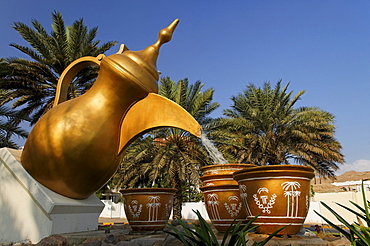 Oversize sculpture of a coffee pot with two cups, Capital Area, Oman, Middle East