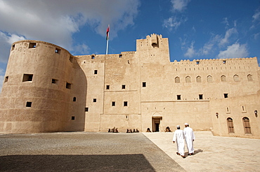 Fort Jabrin with two Omani visitors, Oman, Middle East