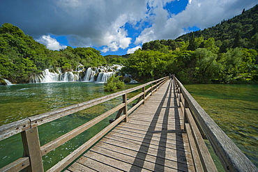 Wooden bridge and waterfalls in Krka National Park, aeibenik-Knin County, Croatia, Europe