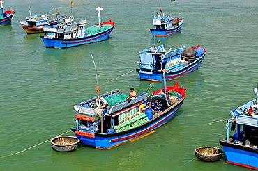 Fishing boats in the harbor of Nha Trang on the Cai river, Vietnam, Southeast Asia