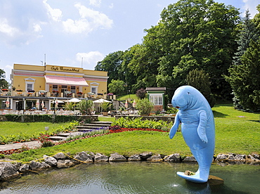 Blue Sea Cow statue, Linda, in the pond in front of Cafe Thermalbad, Bad Voeslau, Lower Austria, Austria, Europe