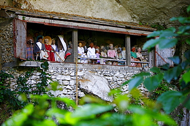 Figures in a rock tomb, Londa, Toraja culture, Sulawesi, Indonesia, Asia