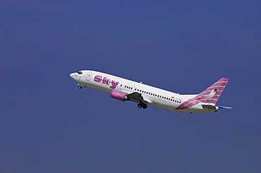 Passenger aircraft from Sky Airlines, a Turkish airline, Boeing 737-400, climbing