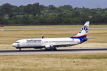 SunExpress aircraft, Boeing 737-800, on the runway of Duesseldorf Airport, North Rhine-Westphalia, Germany, Europe