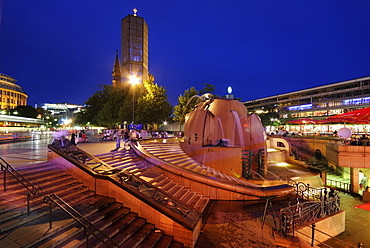 Breitscheidplatz square with World Globe Fountain and Kaiser-Wilhelm Memorial Church at night, Kurfuerstendamm, Charlottenburg, Wilmersdorf, Berlin, Germany, Europe