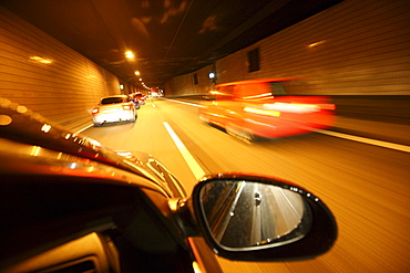 Drive during rush hour on the highway A40, so-called Ruhrschnellweg, city tunnel Essen, Ruhrgebiet region, North Rhine-Westphalia, Germany, Europe