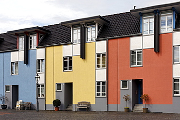 Three modern colorful row houses, Krefeld-Linn, North Rhine-Westphalia, Germany, Europe