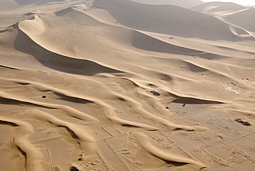 Aerial view of sand dunes with caravan route in the Gobi desert, silk road, Dunhuang, Gansu, China, Asia