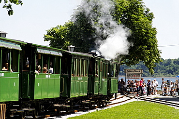 Chiemseebahn train and tourists, Prien Stock, lake Chiemsee, Chiemgau, Upper Bavaria, Germany, Europe