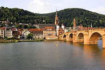 Neckar river, Karl Theodor Bridge towers and the Church of the Holy Spirit bell tower steeple, Heidelberg, Baden-Wuerttemberg, Germany, Europe