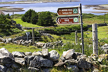 Bed and Breakfast sign posts, Connemara, Republic of Ireland, Europe