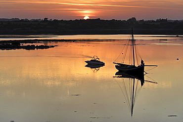 Boats and coastal sunrise, Kinvara, Republic of Ireland, Europe