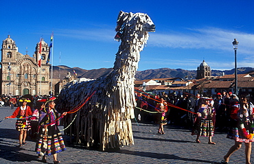 A huge Lama figure is carried over the Plaza de Armas square in Qusco, parade of the Inti Raymi festival, winter solstice festival, important festival of the Inca, Qusco, Peru, South America