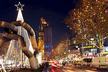 Kaiser-Wilhelm-Gedaechtniskirche or Kaiser Wilhelm Memorial Church, Tauentzienstrasse street at Christmas time at night, Berlin, Germany, Europe