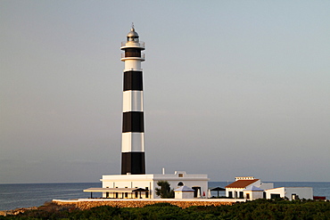 View of the lighthouse at Cap d'Artrutx in the morning light, Menorca, Spain, Europe