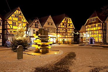 Half-timbered houses in the historic town centre with a Christmas tree and snow, Soest, Sauerland, North Rhine-Westphalia, Germany, Europe