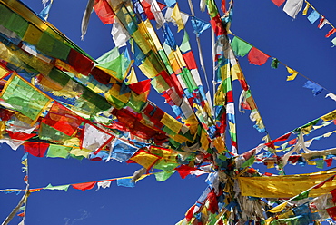 Prayer flags, Tra La Pass, Friendship Highway between Shigatse and Lhatse, Tibet, China, Asia