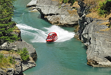 Jet boat, speed boat on Shotover River, Queenstown, South Island, New Zealand