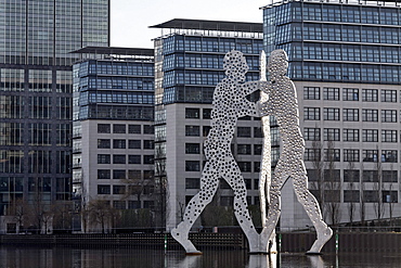 Molecule Man, monumental metal sculpture in the Spree river, Treptowers Allianz administration, Treptow district, Berlin, Germany, Europe